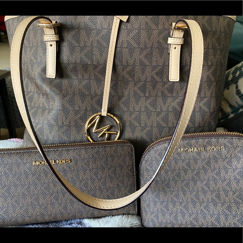 Michael Kors purse, wallet and cosmetic bag.